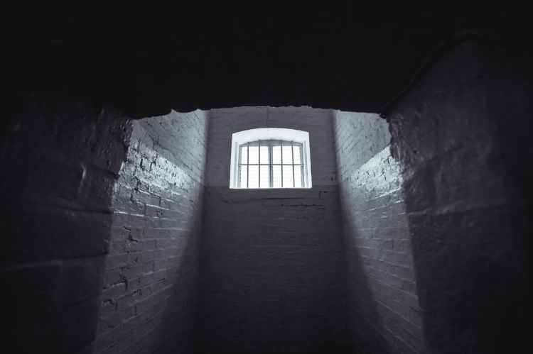 shows dark, loneliness of jail